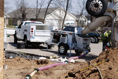 Moving on Up -General Contractor Self Performs Concrete with Trailer Pump
